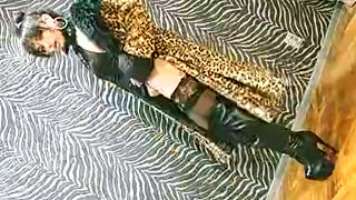Sexy Leopard Coat On Sexy Girl With High Heels Boots